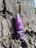 Purple Cyclops Clay Clipper Lighter